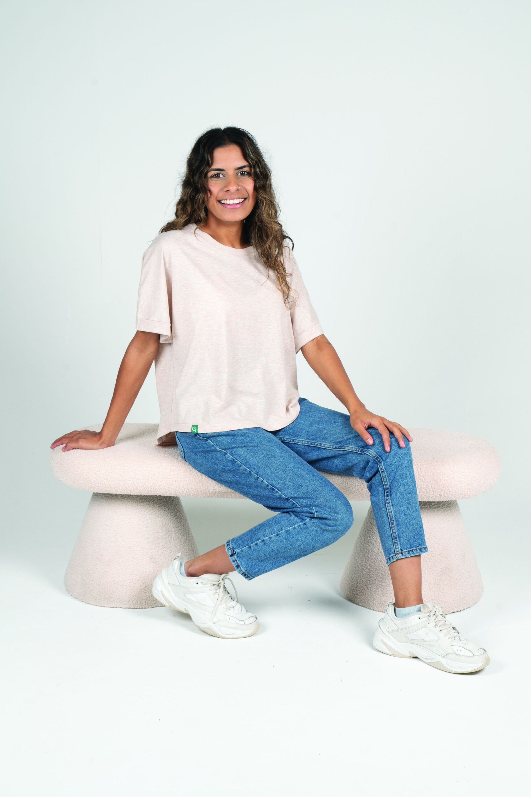 women's rainbow t-shirt seated